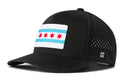 The Haka Hat Chicago Flag Performance 5-Panel Hat features a rectangular Chicago flag patch with four red stars and blue stripes, side ventilation holes, and a Flexfit® sweatband for comfort.