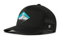 The Haka Hat Diamond Mountain And Trees Performance 5-Panel Hat by Haka Hat features a colorful mountain and sun front graphic, ventilation holes, a Flexfit® sweatband for comfort, snapback fit, and a white H logo near the brim.