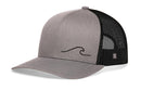 The Haka Hat Wave Trucker Hat in gray and black features a mesh back and simple wave embroidery—this Haka Hat snapback is the perfect laid-back accessory for beach days.
