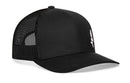 The Haka Hat Mermaid Trucker Hat in black features a comfort-fit snapback, solid front panel, curved brim, black mesh back panels, and a small subtle logo on the front left side.