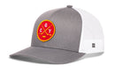 Grey and white Haka Hat Calgary Hockey Trucker Hat featuring a circular patch with crossed hockey sticks, a puck, and the letters G, C, and Y.