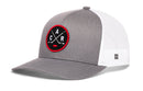 Show your team spirit with the Haka Hat Carolina Hockey Trucker Hat—an eye-catching snapback from Haka Hat. This black and white trucker cap features a breathable mesh back and a round black and red patch on the front, showcasing two crossed hockey sticks and the letters C and A for Carolina Hockey fans.