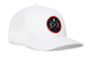 The Haka Hat Columbus Hockey Trucker Hat | CBS X Snapback features a white mesh design and a round embroidered patch on the front with black, red, and white colors, showcasing two crossed hockey sticks and the letters C, B, and S. This classic trucker snapback by Haka Hat offers a comfortable, adjustable fit—perfect for Columbus hockey fans.