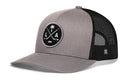 Gray Haka Hat Los Angeles Hockey Trucker Hat with a black mesh back and a circular LA X patch featuring crossed hockey sticks and a palm tree.