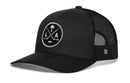 Black Haka Hat Los Angeles Hockey Trucker Hat with a circular LA X patch featuring two crossed hockey sticks, a palm tree, and a hockey puck.
