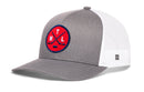 Introducing the Haka Hat Montreal Hockey Trucker Hat | MTL X Snapback by Haka Hat—a gray and white snapback trucker hat featuring a round red patch with two crossed hockey sticks, a small hockey puck, and “MTL” initials on the front. This stylish hat offers breathable comfort with its white mesh back panel and an adjustable snapback closure.