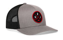 The Haka Hat New Jersey Hockey Trucker Hat | NJ X Snapback by Haka Hat features a gray and black design with a red and black patch displaying crossed hockey sticks, a small map outline, and the letters N and J. This trucker hat includes a mesh back, curved brim, and an adjustable snapback closure for a comfortable fit.
