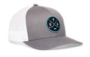 Grey and white mesh Haka Hat Utah Hockey Trucker Hat | UTA X Snapback featuring a circular patch with crossed hockey sticks and the letters UTA.
