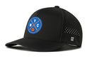 The Haka Hat New York Basketball Performance 5-Panel Hat features a circular blue, orange, and white NYC basketball logo, mesh side panels for ventilation, a Flexfit® sweatband for comfort, and a small H logo above the left ear.