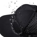 The Haka Hat San Diego Baseball Performance 5-Panel Hat by Haka Hat is shown repelling water on its side, highlighting its durability. This SD X Flexfit® Snapback features ventilation holes, a top button, and an all-day comfortable sweatband.