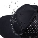 Close-up of water splashing off the Haka Hat Philadelphia Baseball Performance 5-Panel Hat | PHI X Flexfit® Snapback, featuring water-repellent fabric and a comfortable Flexfit sweatband with small white side perforations.