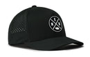 The Haka Hat Nebraska Performance 5-Panel Hat features a black design with a round white NEB patch, ventilated side panels, and an adjustable Flexfit® Snapback for comfort.