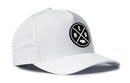 The Haka Hat Nebraska Performance 5-Panel | NEB X Flexfit® Snapback is a white mesh cap with a black circular patch featuring intersecting lines, the letters N, E, B, and a small rectangle—a unique Nebraska State hat.