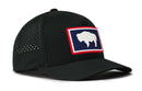 The Haka Hat Wyoming Flag Performance 5-Panel Hat features a blue rectangular patch with a white buffalo and red border, ventilation holes on the sides, and a Flexfit® sweatband for all-day comfort. Brand: Haka Hat.