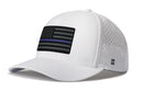 The Haka Hat Thin Blue Line Performance 5-Panel Hat features a black, gray, and blue American flag patch, perforated side panels, Flexfit® sweatband, snapback closure, and a small H logo on the left. Perfect for comfort and style.