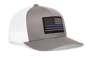 The Haka Hat Thin Blue Line Trucker Hat | Gray-White Police Tactical Snapback features a black and gray American flag patch with a blue line. Show your support and style with this snapback from Haka Hat.
