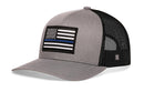 Show your support with the Haka Hat Thin Blue Line Trucker Hat—a gray and black mesh snapback featuring a black and white American flag with a blue line. From Haka Hat, this is the ideal Gray-Black Police Snapback for supporters.