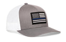 The Haka Hat Thin Blue Line Trucker Hat is a gray and white police snapback featuring a black-and-white American flag patch with a blue stripe, plus a white mesh back for breathability and comfort.