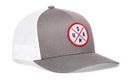 The Haka Hat USA Trucker Hat is a gray and white snapback featuring a round America patch with a red border, blue “USA” lettering, and a blue star. Classic white mesh back for breathability. Brand: Haka Hat.