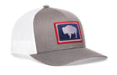 The Haka Hat Wyoming Flag Trucker Hat in gray and white features a mesh back and a rectangular patch with a blue background, red border, and a white bison silhouette. This WY snapback is by Haka Hat.