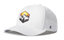 Introducing the Haka Hat Hexagon Mountain Trees Performance 5-Panel Hat—an outdoors Flexfit snapback from Haka Hat. This white hat features a hexagonal patch on the front, displaying a stylized mountain, forest, and sunset design. The side panel is equipped with ventilation holes and showcases a small black H logo, offering sleek style paired with the comfort and functionality of an outdoor performance hat.