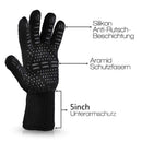 The Vigor BBQ Grill Gloves Cut & High Heat Resistant Gloves - Set of 2 are black, with silicone anti-slip coating, aramid fiber cut resistance, and a 5-inch extended cuff. German text labels highlight these protective features.