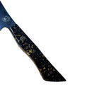 A close-up of the Spaceman Knives Galaxy Series Boning Knife shows its black handle with gold flecks on a wooden surface, wood grain visible, and part of the precise 10CR18MOV steel blade for meat preparation in view.