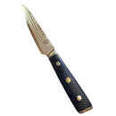 The Spaceman Knives Interstellar Utility Knife features a shiny AUS-10 Damascus blade with a black honeycomb-patterned handle and gold accents, elegantly resting on a speckled countertop.