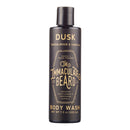 A black bottle of The Immaculate Beard Immaculate Beard Body Wash Paraben Free Gentle Foaming Formula (7.5 oz) in sandalwood and vanilla scent, featuring gold text and a flip cap. This hand-poured, paraben-free body wash is crafted for premium gentlemen’s grooming.