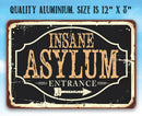 The Lone Star Art Insane Asylum - Metal Sign is a vintage-style aluminum sign (12x8) with “INSANE ASYLUM ENTRANCE” and an arrow, distressed edges, and is perfect as a funny indoor or outdoor Halloween decoration.