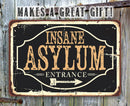The Lone Star Art Insane Asylum - Metal Sign features "INSANE ASYLUM ENTRANCE" with a right arrow. Perfect as a funny Halloween decoration or gift, it's ideal for indoor or outdoor use to add a spooky touch.