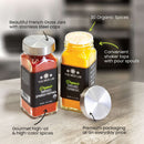 Six glass spice jars with stainless steel caps from The Spice Lab sit on a table, each labeled as part of the Organic Starter Spice Set. Text highlights the quality, convenience, premium packaging, and USDA Certified Organic spices—a perfect choice for anyone seeking an ideal organic starter spice set or a thoughtful kitchen gift from The Spice Lab.