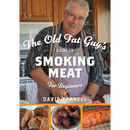 The cover of The Old Fat Guy’s Guide to Smoking Meat for Beginners - Paperback features a smiling man in an apron preparing food in a kitchen, with inset photos of smoked meat recipes below the title.