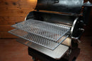Two metal mesh racks from a Pimp My Grill® Gen2 Slide-Out Rack System for the Recteq Flagship 1250 pulled out from a pellet grill.