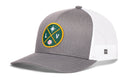 Introducing the Haka Hat Las Vegas Baseball Trucker Hat | LV X Snapback—a gray and white mesh snapback trucker hat by Haka Hat, showcasing a striking green, yellow, and white LV X green and gold embroidered patch with a baseball and star design on the front. Perfect for any fan of Las Vegas baseball trucker hats!.