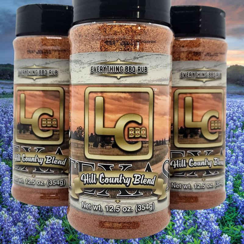 LC BBQ Hill Country Blend Everything BBQ Rub LC BBQ on background of bluebonnets in Texas Hill Country. 