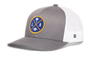 Introducing the Haka Hat Los Angeles Trucker Hat—a black LA X Football Snapback by Haka Hat featuring a mesh back and a round patch with an LA logo, palm tree, football, and crossed lines on the front—ideal for fans looking for an authentic way to rep Los Angeles football style.