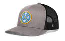 The Haka Hat Los Angeles Trucker Hat | Black LA X Football Snapback by Haka Hat features a stylish gray and black mesh design with a blue and yellow LA patch adorned with a palm tree, football, and X-shaped lines on the front—making it the ideal snapback for any Los Angeles trucker hat enthusiast.