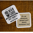 DDR BBQ Supply Manly Cans gift card with a handwritten Veterans Day message on a rustic wooden surface