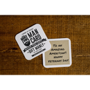 DDR BBQ Supply Manly Cans man card gift note with handwritten Veterans Day message on a wooden surface