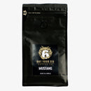 A black bag of Got Your Six Coffee Co. Mustang blend, 8 oz, is ready to pair with any Manly Cans 3.5 Gallon WeekCAN Warrior Gift Can. The bag features a pull tab and a gold and white six-with-wings logo.
