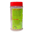 A spice jar of Meat Church Garlic & Jalapeño Blanco BBQ Rub is displayed with its back label facing forward, featuring the product story and company details in bold red and yellow text against a green background. Social media icons and a signature appear at the bottom of the label, identifying this all purpose BBQ rub as part of the Meat Church collection.