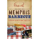 Book cover for Memphis Barbecue: A Succulent History of Smoke, Sauce & Soul - Hardcover from Books by splitShops, featuring a pig outline, classic barbecue dishes such as pulled pork, and the tagline "A Succulent History of Smoke, Sauce & Soul" against a red checkered tablecloth backdrop—capturing the soulful spirit of Memphis barbecue and its rich connection to blues music.