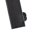 A close-up of the Messermeister Black Magnetic Leather Edge-Guard - 10.5" shows light blue edges and visible stitching, with the rounded ends of two objects partially revealed inside.