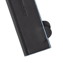 Close-up of a black leather Messermeister Magnetic Edge-Guard, 8.5", with light blue edges and visible stitching, partially open to reveal knife handles. The Messermeister logo is embossed, giving it a stylish and protective look.