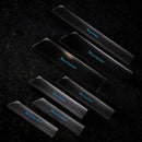 The Messermeister Edge-Guard Set - 7 Piece includes black knife guards in various sizes, each displaying the Messermeister name in blue, arranged on a dark textured background for secure and stylish knife storage.