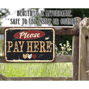 The Lone Star Art “Please Pay Here - Metal Sign” is shown on a wooden gate among wildflowers, with the text: Beautiful & Affordable. Durable for indoor or outdoor cashier areas.
