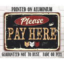 The Lone Star Art Please Pay Here - Metal Sign features bold, distressed lettering on rustproof aluminium; this vintage-style indoor/outdoor sign is durable and ideal for marking cashier areas.