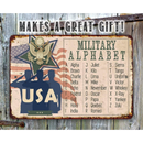 The Lone Star Art USA Military Alphabet - Metal Sign features the USA Military Alphabet, American flag, emblem, and saluting soldiers—makes a unique military gift!.