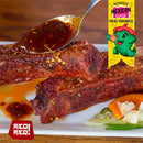 A spoon drizzles spicy sauce, intensified with Rico Rico Arbol Chile Powder Shaker and natural seasonings, over two seasoned ribs on a white plate, garnished with pickled vegetables. A vibrant banner proclaims Authentic Mexican Flavor alongside a cartoon pepper, while the Rico Rico logo sits in the corner.